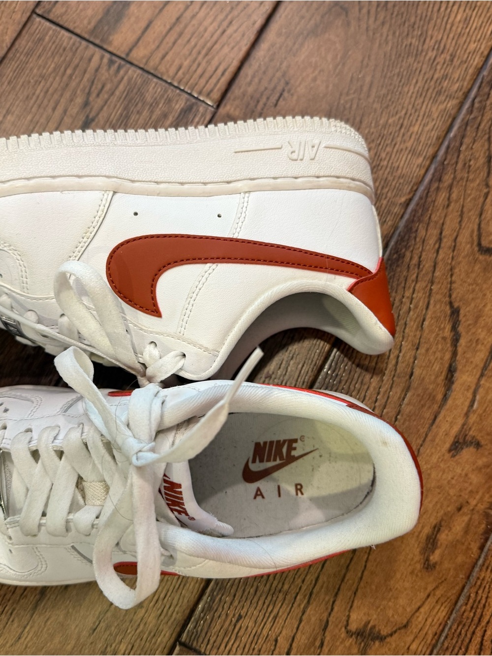 Nike White Sneakers with Red Swoosh